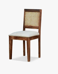 Dining chair with rattan cane backrest and 40 density foam cushioned fabric seat by Sunrise Furniture