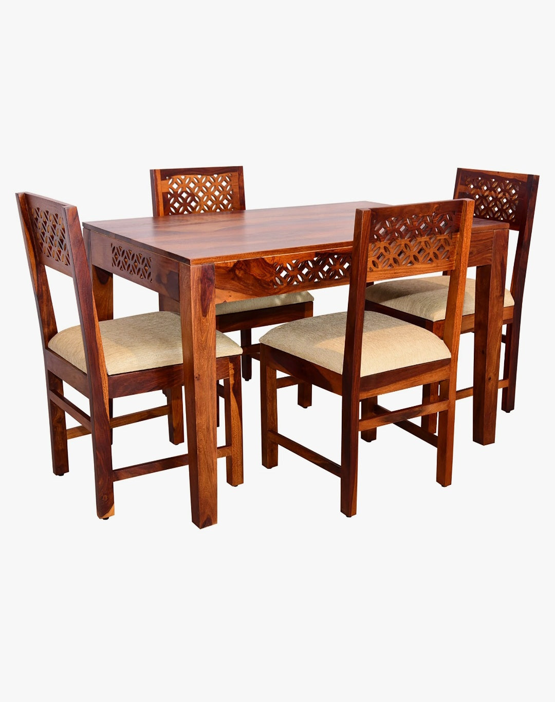 Jigsaw cutting design Sheesham wood dining table set with cushioned chairs, angled view