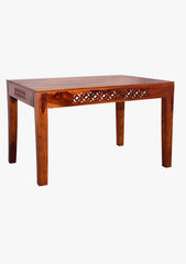 Solid Sheesham wood dining table with jigsaw cutting design, close-up view