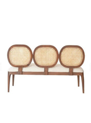 Back side view of wooden 3 seater bench with cane back design and fabric seating